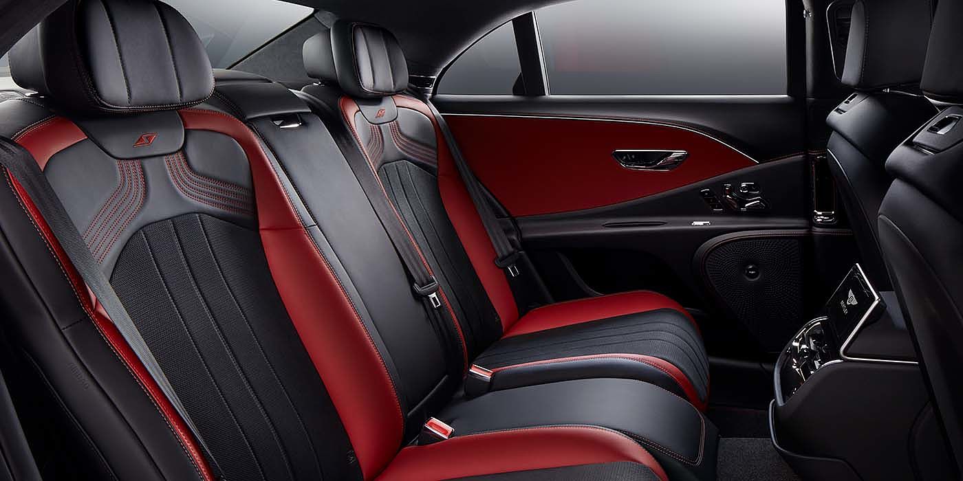Bentley Monterrey Bentley Flying Spur S sedan rear interior in Beluga black and Hotspur red hide with S stitching