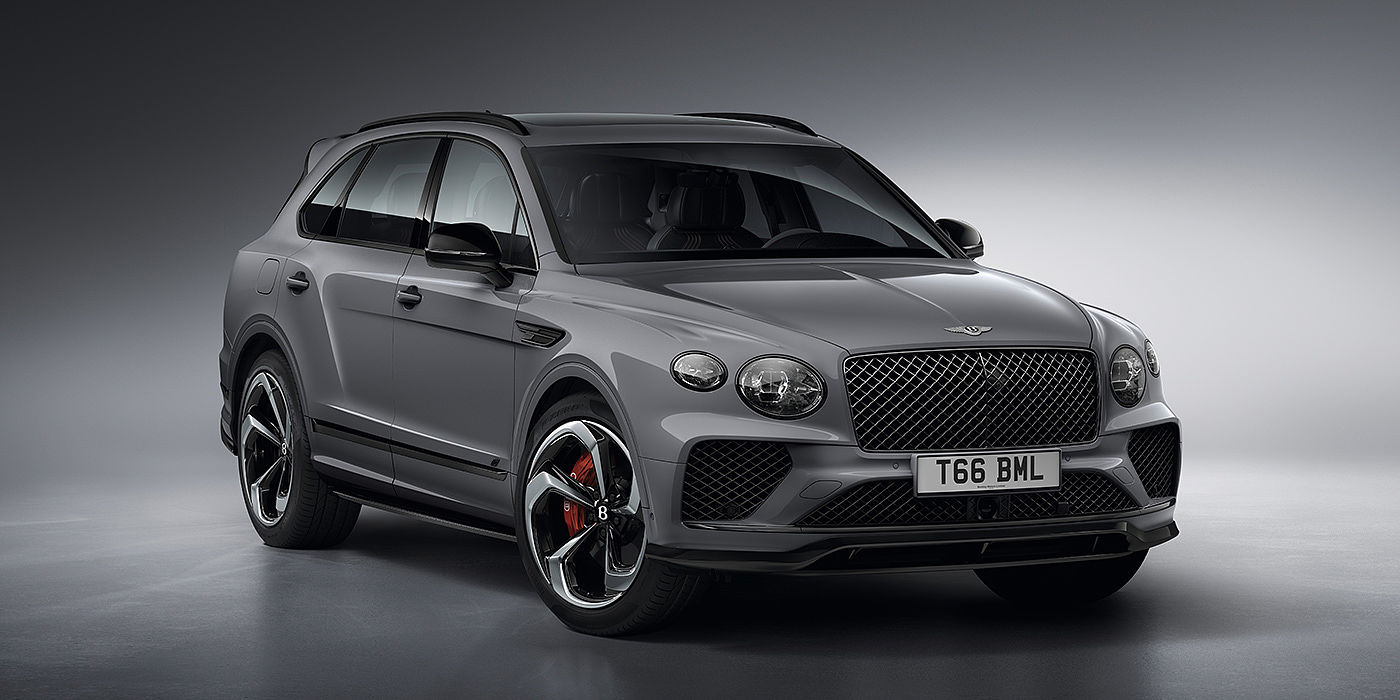 Bentley Monterrey Bentley Bentayga S in Cambrian Grey paint front three - quarter view with dark chrome matrix grille and featuring elliptical LED matrix headlights. 