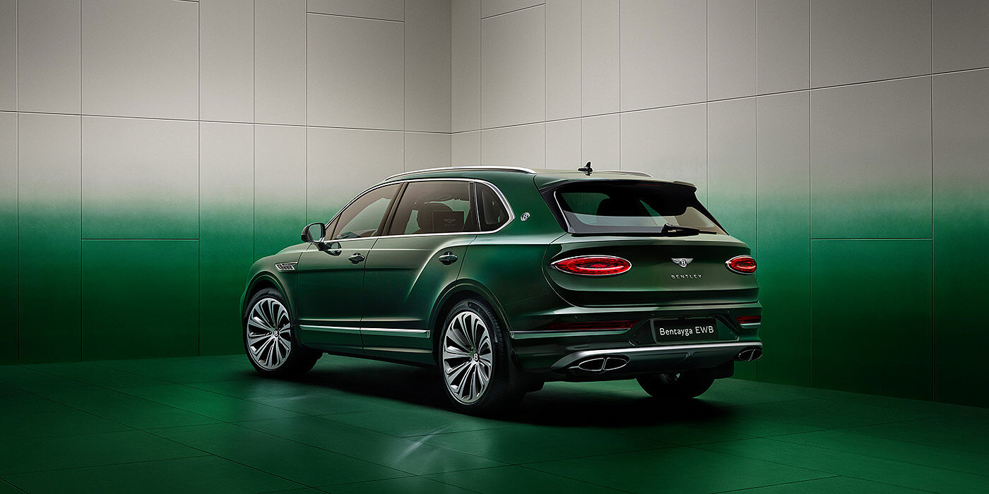 Bentley Monterrey Bentley Bentayga Extended Wheelbase SUV Rear three quarter view in Light Emerald green paint in green and grey room
