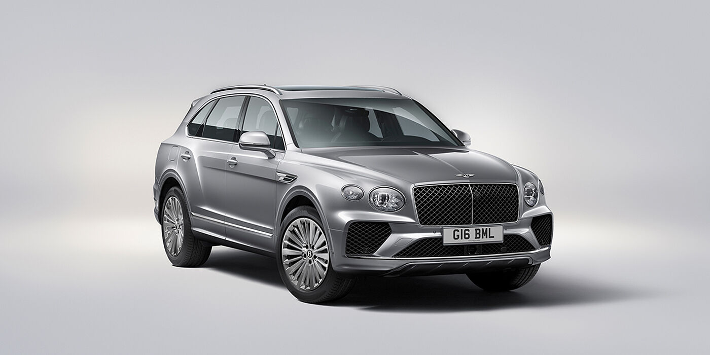 Bentley Monterrey Bentley Bentayga luxury SUV front three quarter view in Moonbeam paint with matrix grille and 21″ 5 spoke painted wheels