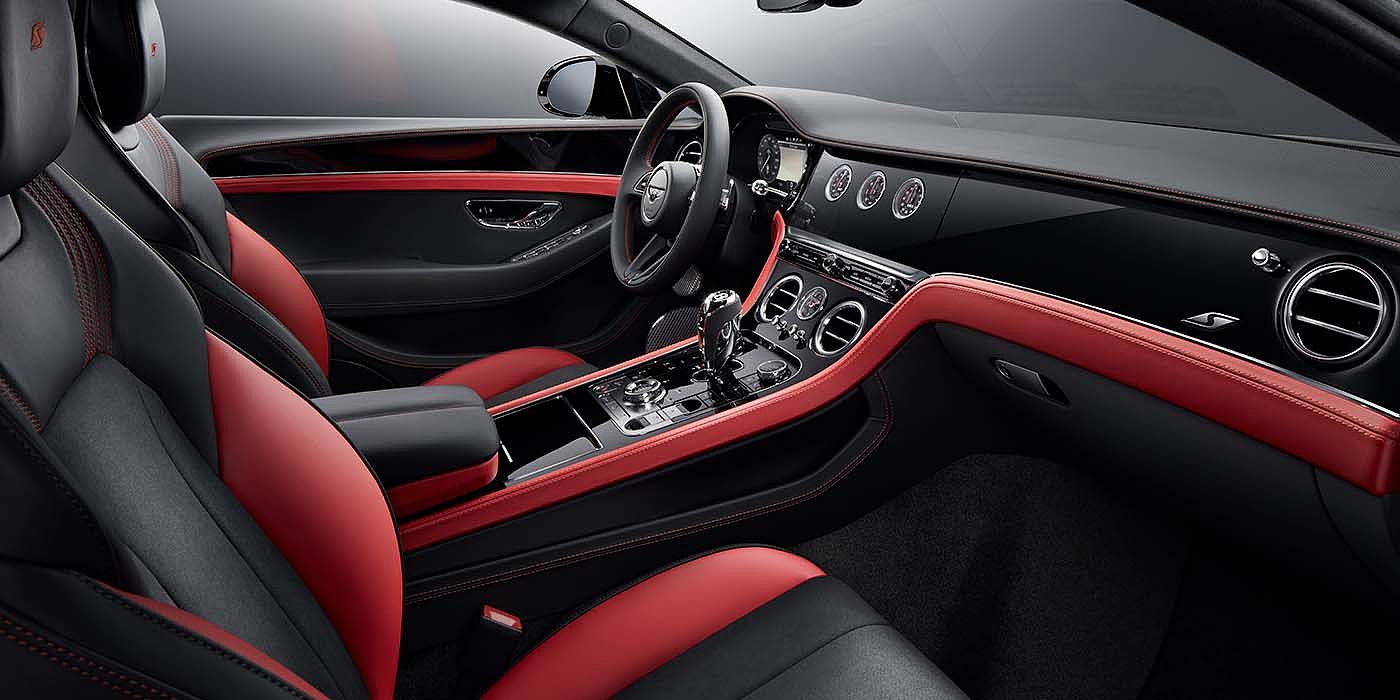 Bentley Monterrey Bentley Continental GT S coupe front interior in Beluga black and Hotspur red hide with high gloss Carbon Fibre veneer