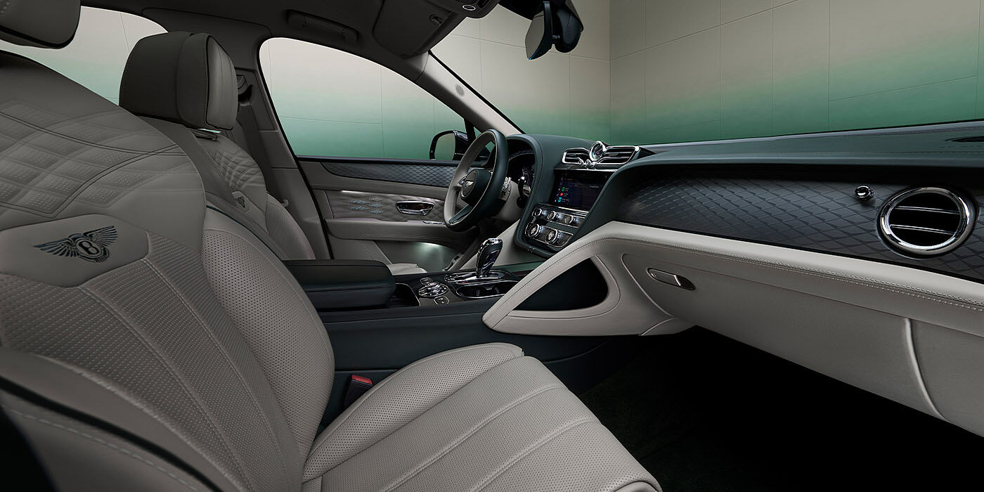 Bentley Monterrey Bentley Bentayga Extended Wheelbase Atelier Edition SUV front interior in Portland and Cumbrian Green hides with Dark Tint Diamond Brushed Aluminium veneer