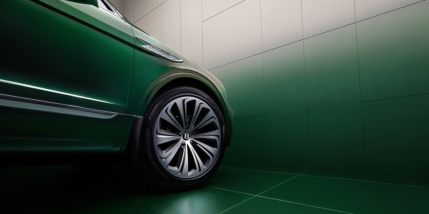 Bentley Monterrey Bentley Bentayga Extended Wheelbase Atelier Edition SUV in Light Emerald green paint front side detail with 22 inch 10 spoke wheel